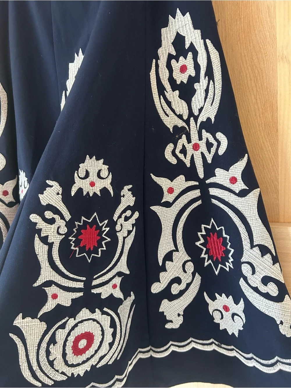 Sunny Leigh Navy Circle a-line Skirt with Cream and Red Embroidery, size 10